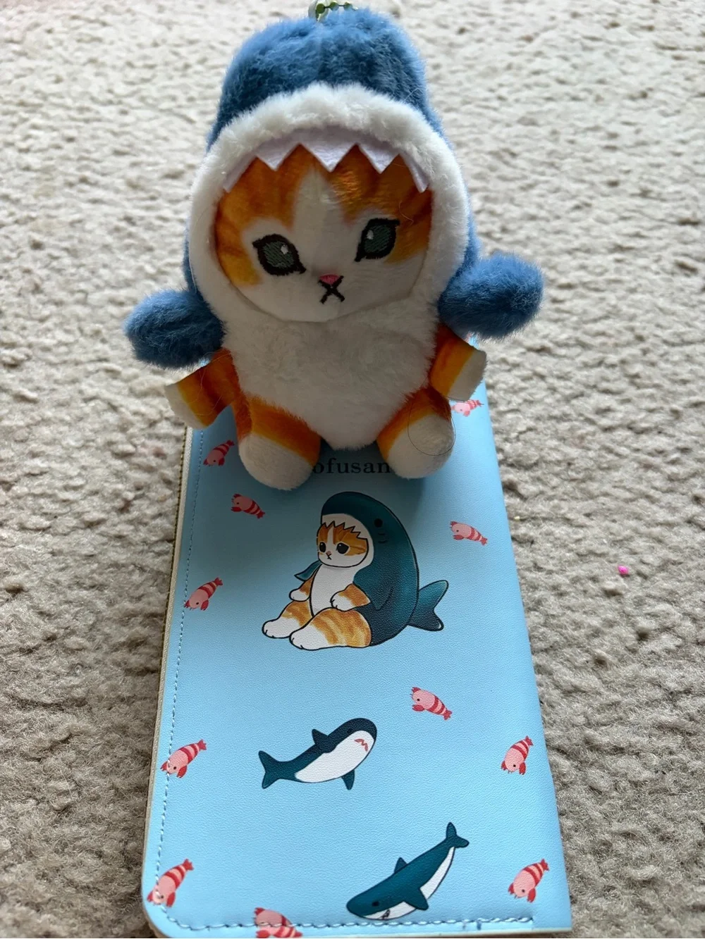 Mofusand shark plush keychain and wallet duo.
